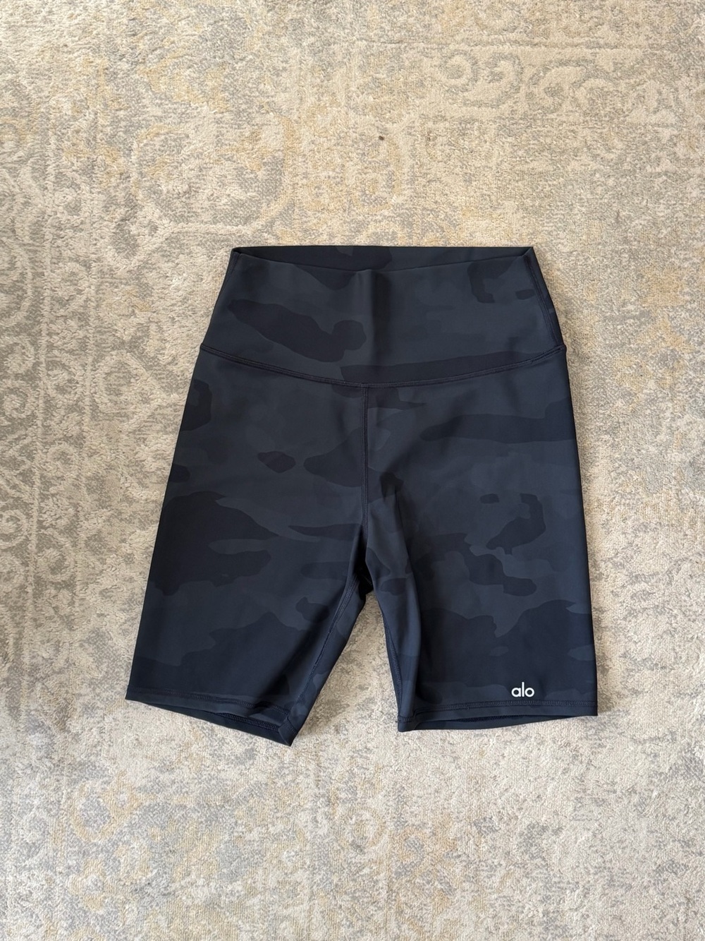 Alo women’s Black Camo High-Rise Biker Shorts.